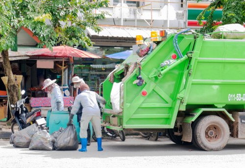 Community members participating in waste disposal